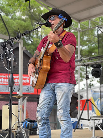 Forrest Pike performing on stage